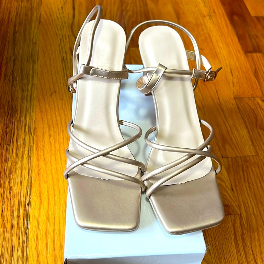 Brand new champagne colored strappy heels size 38, fits US 7.5